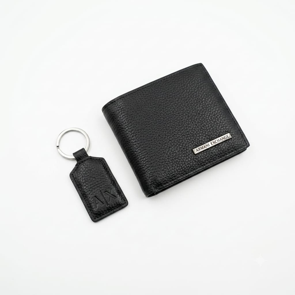 Live top-down view of the closed Armani Exchange premium presentation gift box featuring the silver brand logo text centered on the black cover