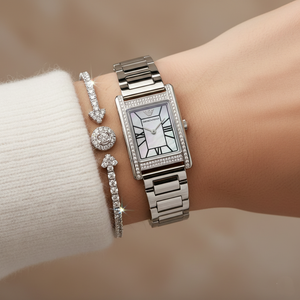 Extreme wrist macro of Armani AR11625 showing rectangular pearl dial and crystals