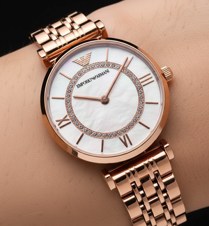 Extreme close-up of Armani AR1909 showing pave set crystal circle on MOP dial