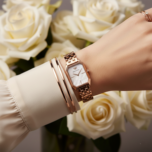 Elegant woman wearing Emporio Armani AR11147 rose gold watch with silk blouse