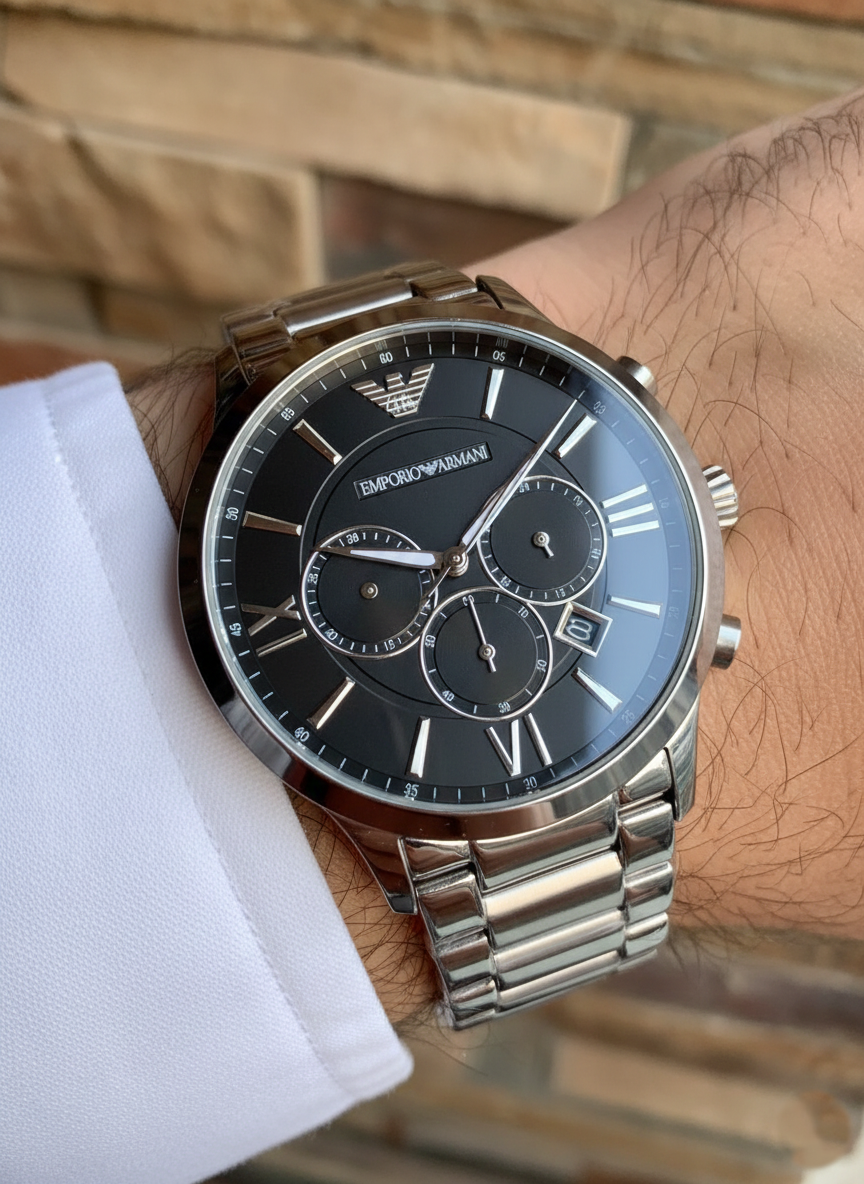 Extreme wrist macro of Armani AR11208 showing black dial and silver Roman numerals