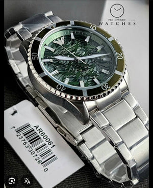 Detailed view of the luminous hands and indices on the Emporio Armani AR60061 dial