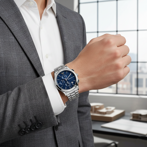 Modern architect wearing Emporio Armani AR11528 textured blue watch with grey blazer