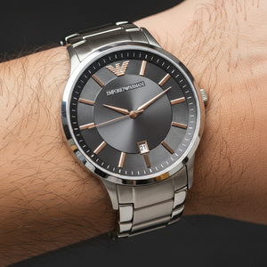 Extreme wrist macro of Armani AR2514 showing grey dial texture and rose gold markers