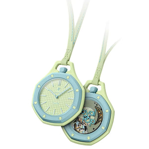 Light blue and green watch with a detailed face on a white background