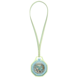 Green and blue device with a lanyard on a white background