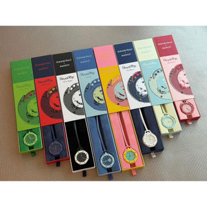 Six Royal Pop Quartz wristwatches in different colorways, displayed in their original retail packaging on a textured beige fabric background.