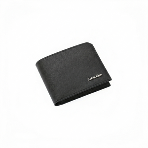 Straight-on front view of a closed Calvin Klein men's black saffiano leather wallet displaying a small silver metal logo on the bottom corner