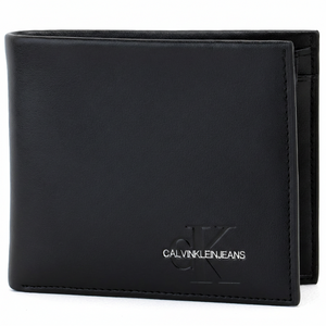 Detailed front view of a Calvin Klein Jeans black smooth leather wallet showcasing the elegant silver-toned brand logo and debossed monogram
