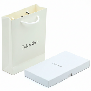 Calvin Klein shopping bag and box on a white background