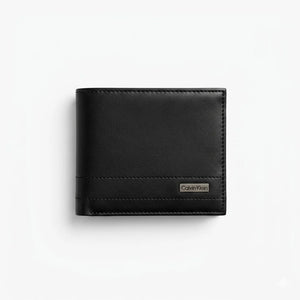 Black leather wallet with Calvin Klein logo on a white background
