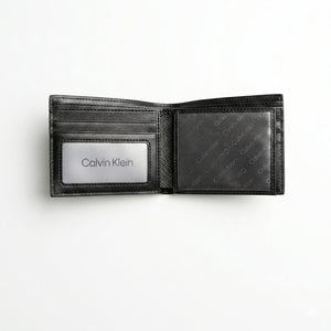 Interior layout view of the opened Calvin Klein mirror original leather bifold wallet showcasing multi-card slots and dual clear ID windows
