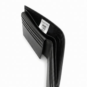 Internal layout view of the opened Calvin Klein mirror original leather bifold wallet showcasing symmetrical card slots and debossed text branding