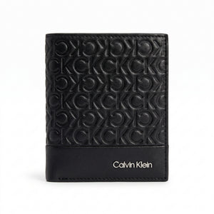 Straight front view product photograph of the Calvin Klein mirror original monogram black leather bifold wallet showcasing the silver text logo accent