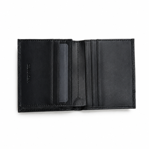 Black leather wallet open on a white background