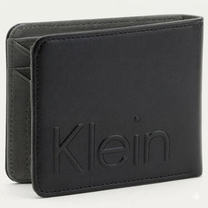 Straight studio view of the Calvin Klein mirror original black leather wallet back panel showing the debossed Klein text logo alongside the standalone matching keychain