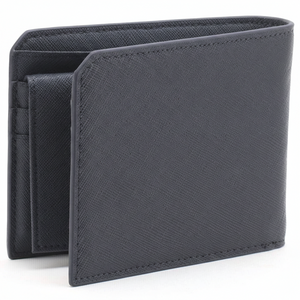 Rear perspective view of a standing Calvin Klein men's navy blue saffiano leather wallet highlighting the clean minimalist back design and durable edge stitching