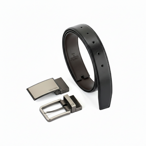 Calvin Klein men's reversible leather belt gift set featuring the black leather side with two premium metal buckles in a circular display