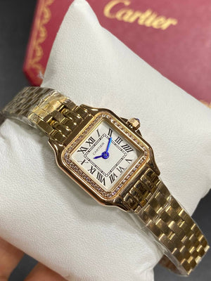 Cartier Panthère de Cartier women's quartz watch, small model case, silver dial, stone-set bezel, rose gold-tone bracelet – in hand view
