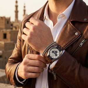 Lifestyle photo of Fossil CH2890 showing the watch on a man's wrist with brown cuff leather strap