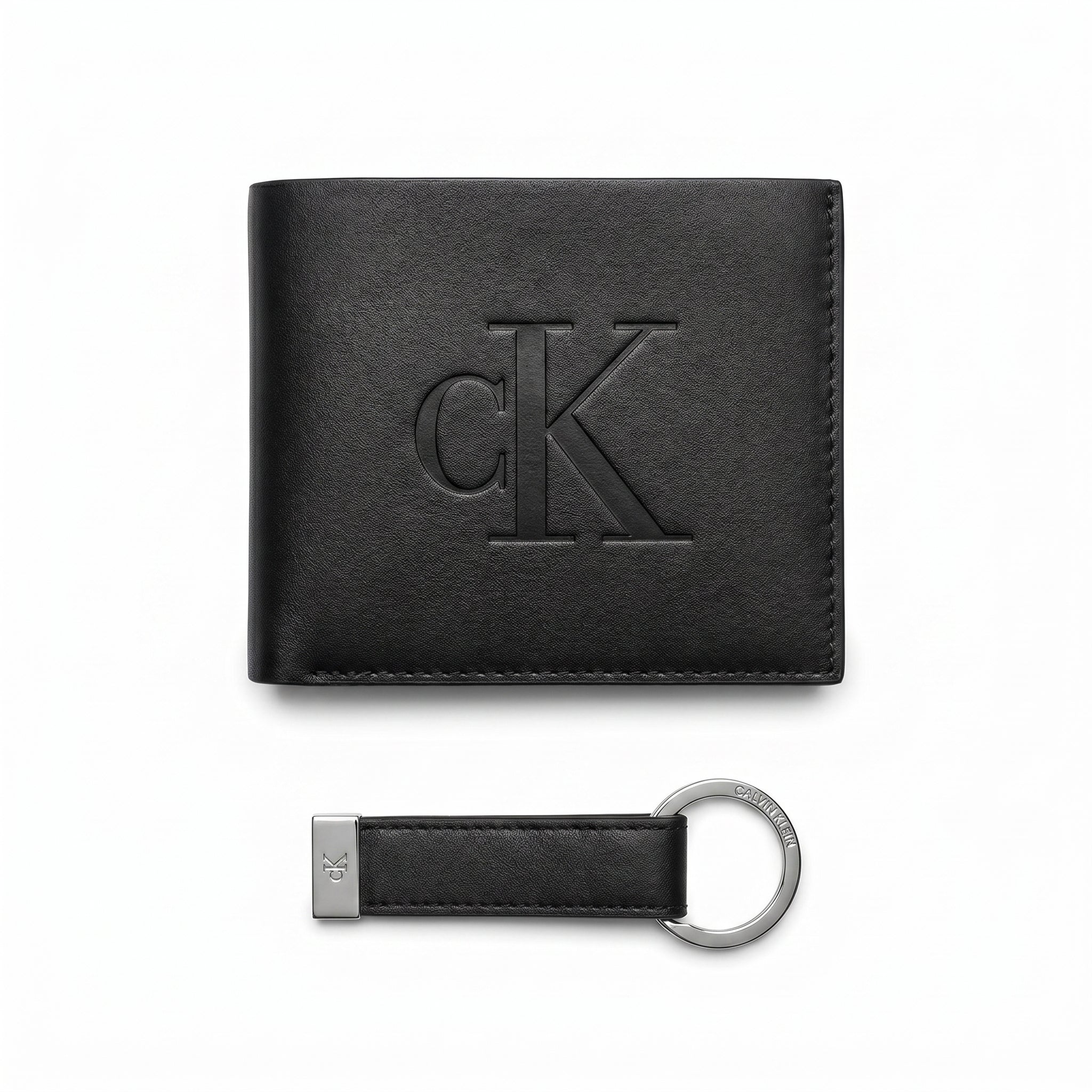 Front view of the Calvin Klein black leather wallet featuring a large embossed logo alongside the matching leather key fob