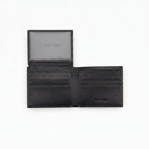 Internal layout view of the Calvin Klein genuine leather bi-fold wallet showcasing organized card slots and fine stitching