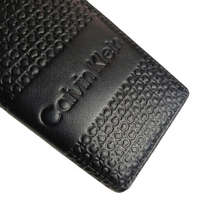 Macro close-up view showing the high-quality genuine leather texture and precision embossed ck monogram on the wallet