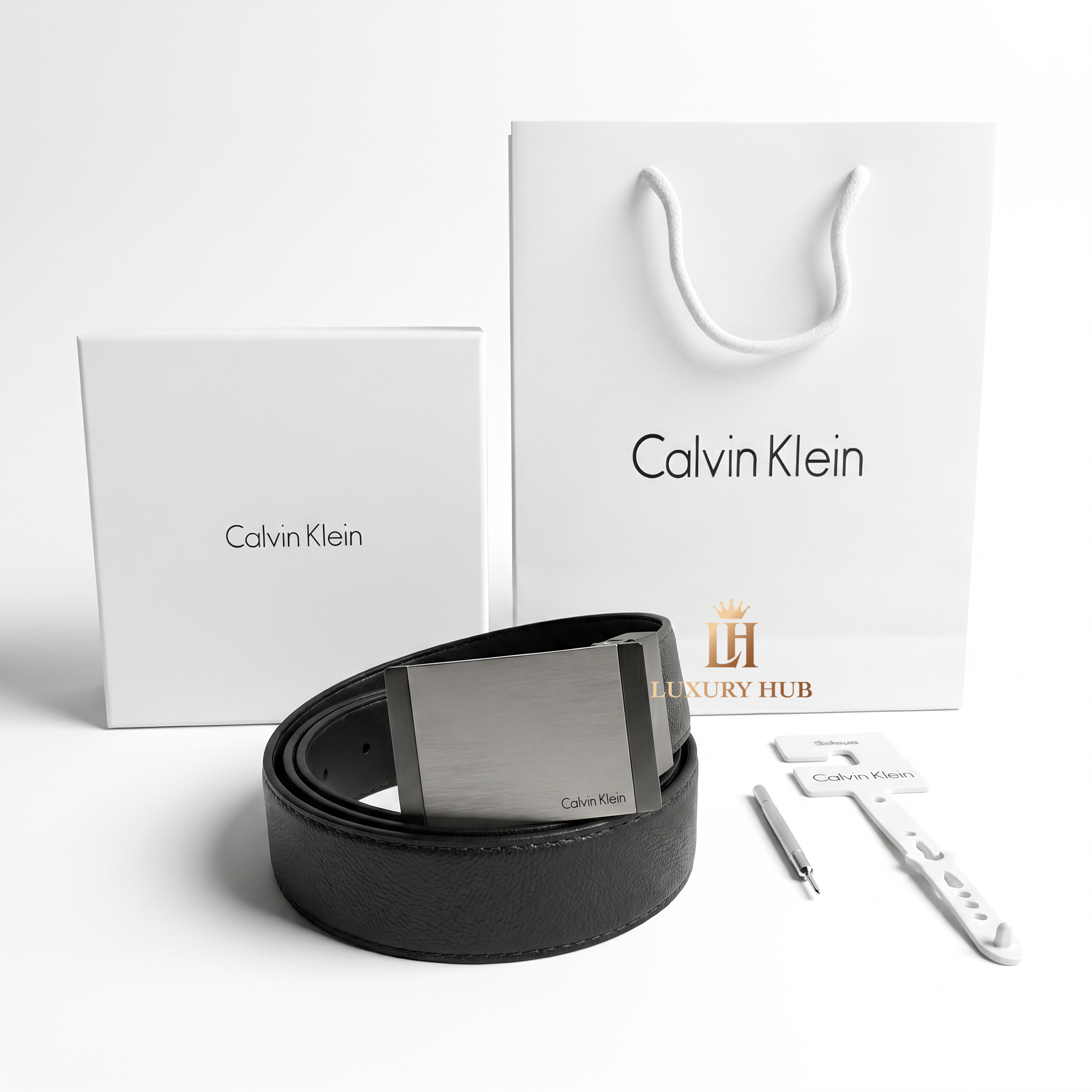 Professional standing view of the Calvin Klein mirror original reversible leather belt featuring the matte designer buckle