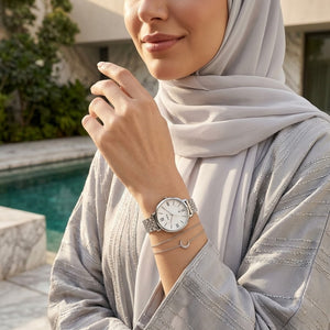 Lifestyle photo of Fossil ES3433 showing the watch on a woman's wrist with silver bracelet