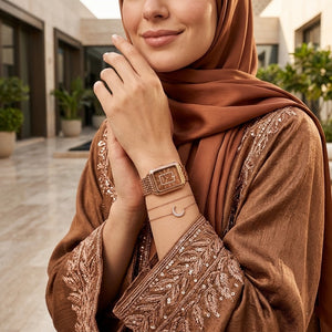 Lifestyle photo of Fossil Raquel ES5323 showing the watch on a woman's wrist with rose gold bracelet