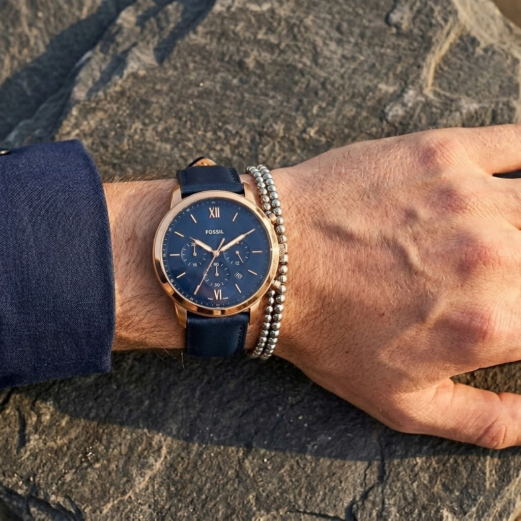 Fossil Neutra FS5454 silver and blue chronograph watch with blue leather strap - Close up shot on wrist - 02