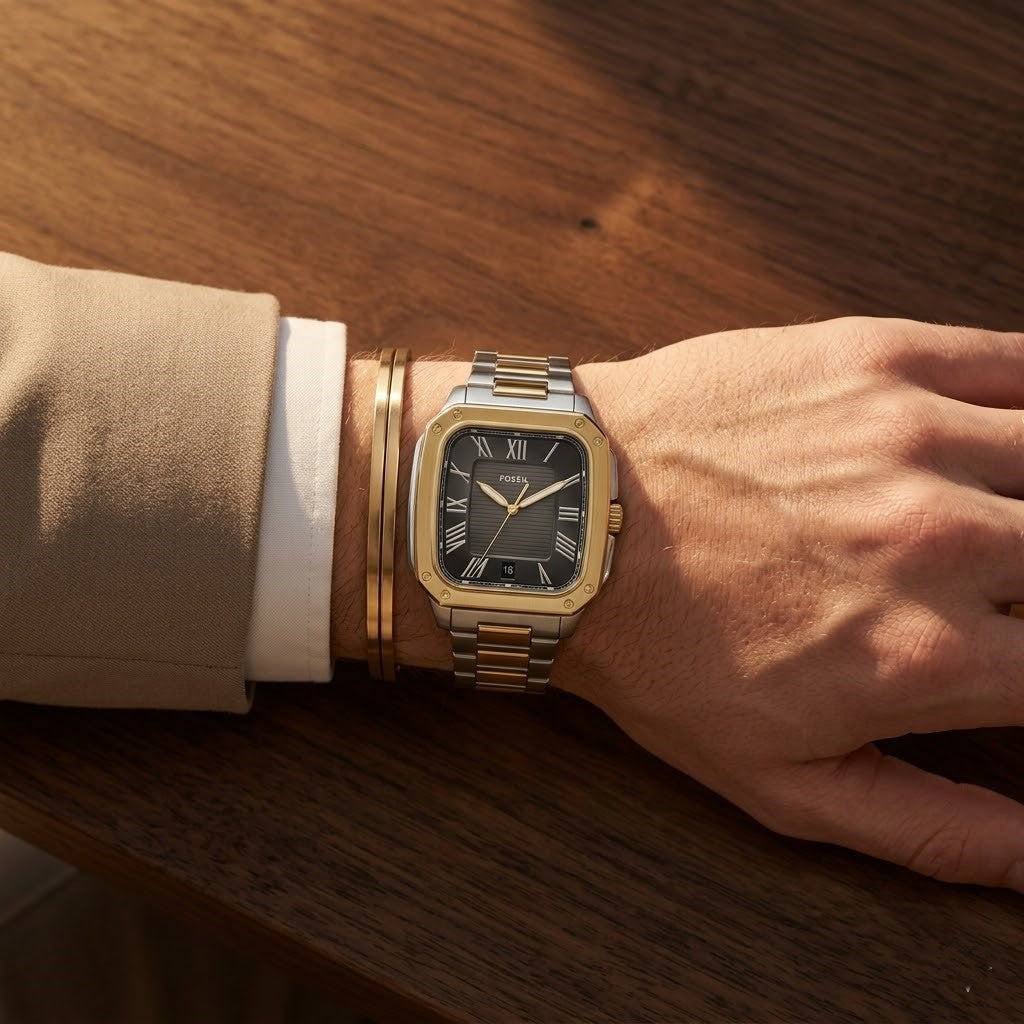 Close up shot of Fossil FS6123 on wrist showing square black dial and gold accents
