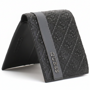 Perspective view of a standing Guess men's black leather bifold wallet showcasing the all-over embossed logo pattern and silver metal lettering