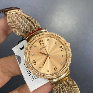 Authentic real-life photo of the Guess Chiffon W1083L3 watch showing actual rose gold mesh finish
