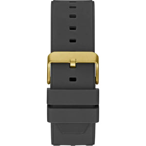 Gold-tone stainless steel buckle clasp with Guess logo on the black silicone strap of the GW0325G1