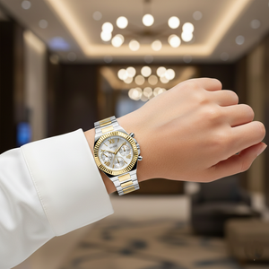 Elegant woman wearing Guess Equality GW0769L3 two-tone watch with a luxury accessory stack