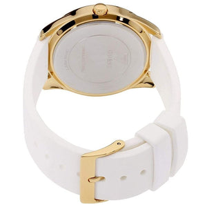 Gold tone stainless steel buckle clasp with Guess logo on the white silicone strap of the W0911L7