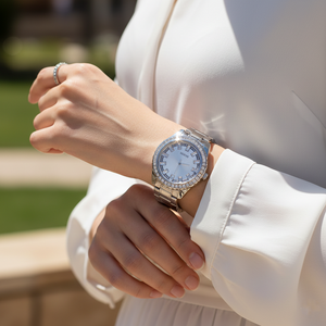 Female model wearing Guess GW0111L1 silver sparkle watch with a glamorous outfit