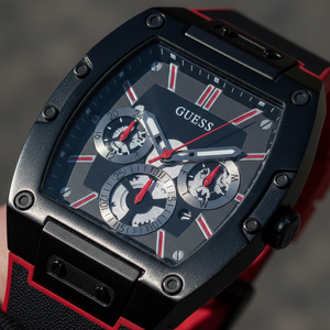 Close up shot of Guess GW0202G7 on wrist highlighting the skeleton dial and red hands