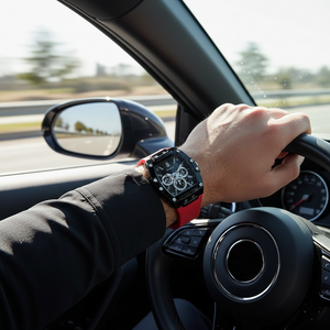 Male model wearing Guess GW0203G4 black and red rubber watch with a sporty outfit