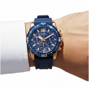 Close up shot of Guess GW0211G4 on wrist highlighting the blue textured dial and rose gold hands