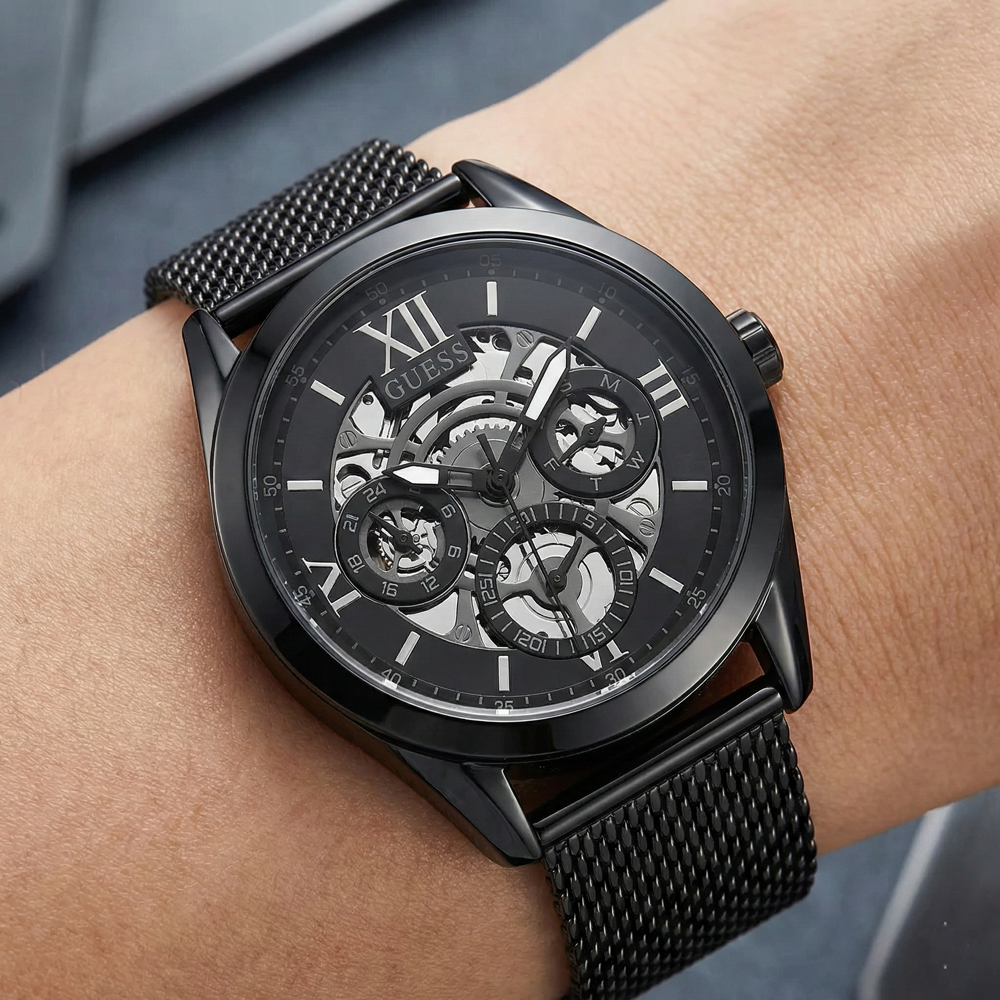 Detailed close-up of the black multifunction dial and black markers of Guess GW0368G3