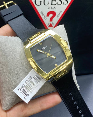 Authentic real-life photo of the Guess GW0386G3 showing actual gold shine and leather texture in Egypt