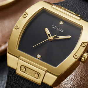 Close up shot of Guess GW0386G3 on wrist highlighting the black minimalist dial and diamond markers