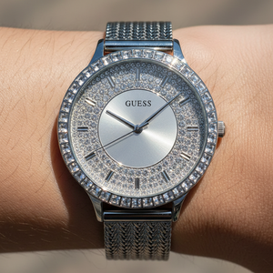 Close up shot of Guess GW0402L1 on wrist showing the silver glitz dial and baguette crystal bezel