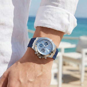 AI lifestyle shot of a man wearing the Guess GW0417G1 silver and blue watch