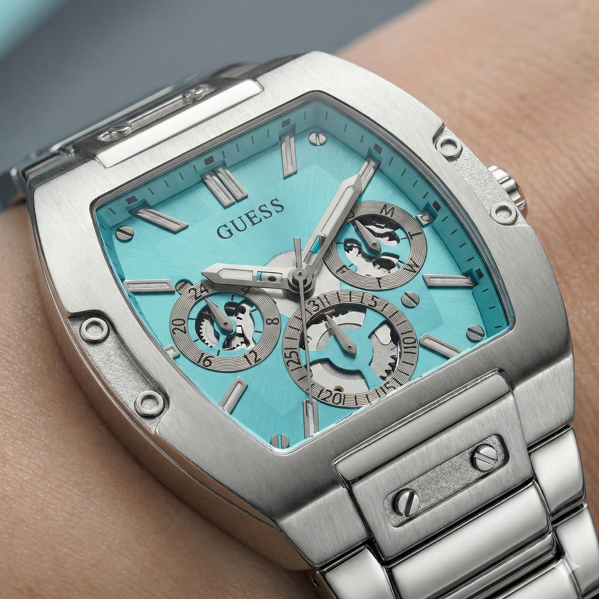Detailed close-up of the Tiffany blue multifunction dial on Guess Phoenix GW0456G4