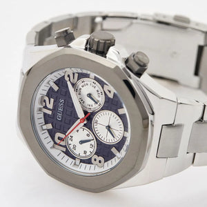 Left side perspective of the Guess GW0489G1 blue textured dial and silver link bracelet