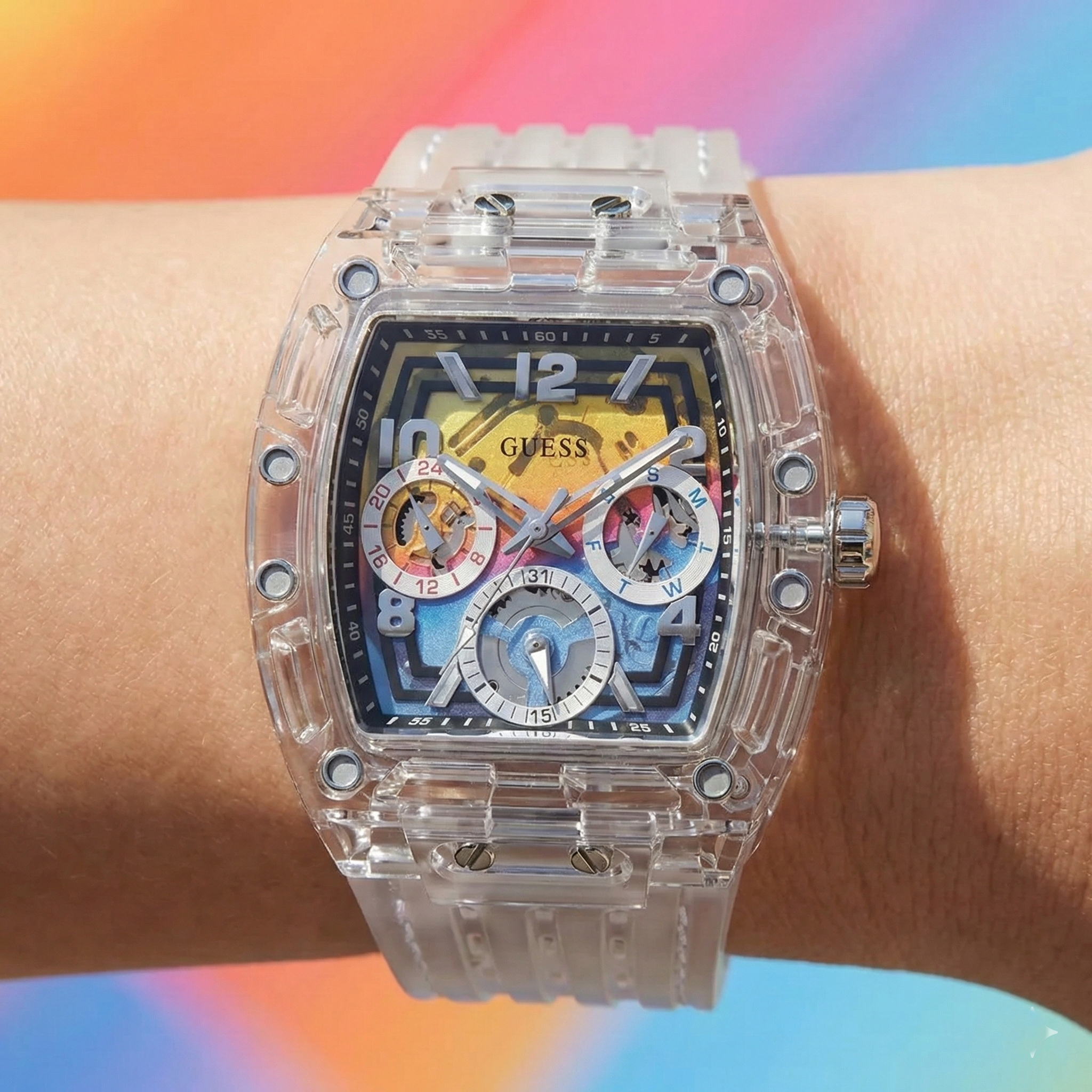 Detailed close-up of the multicolor rainbow skeleton dial on Guess GW0499G3