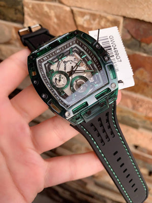 Real-life image of Guess GW0499G7 showing actual green transparency and dial depth